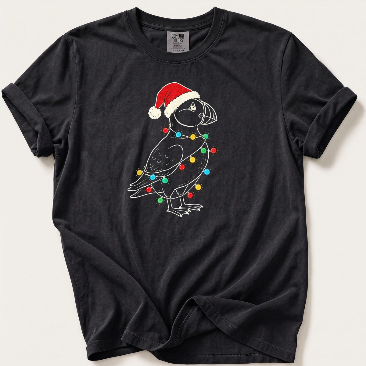 Fairy Light Puffin Outline — Black Comfort Colors tee