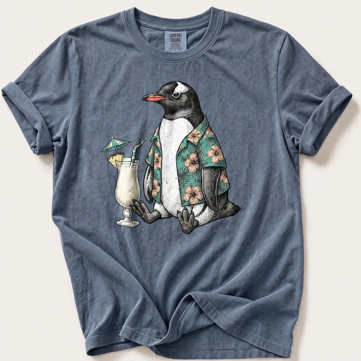Tropical Penguin — Blue Jean Comfort Colors tee