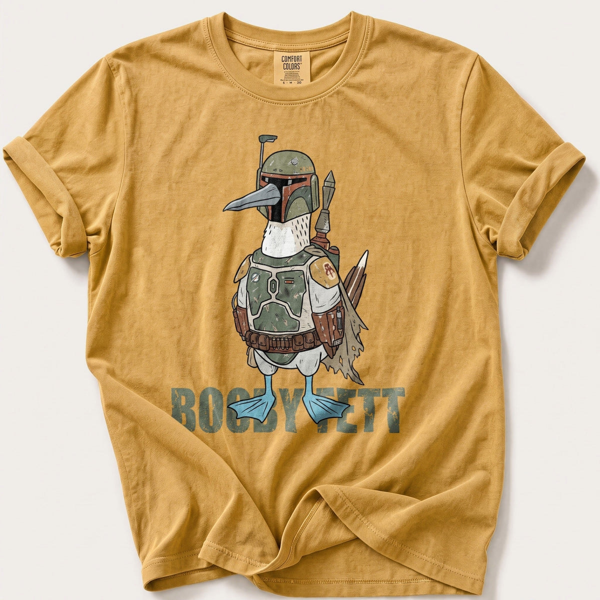 Booby Bounty Hunter — Mustard Comfort Colors tee