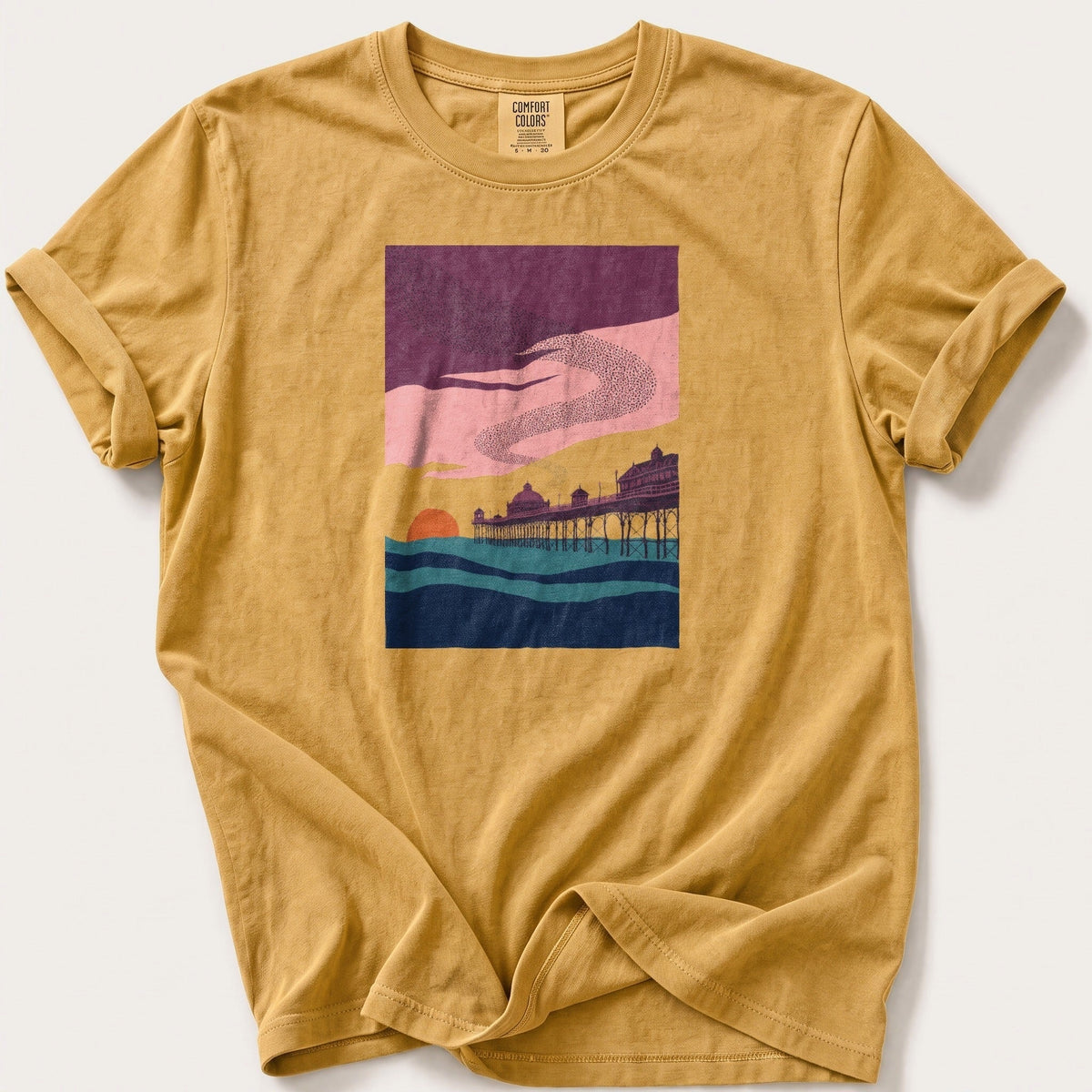 Murmuration Over The Pier — Mustard Comfort Colors tee